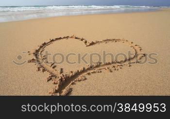 Herz am Sandstrand