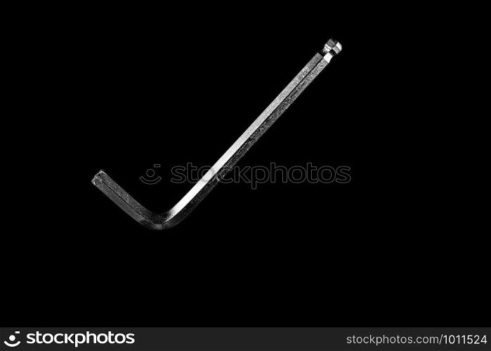 hexagon wrench for screws on black isolated background