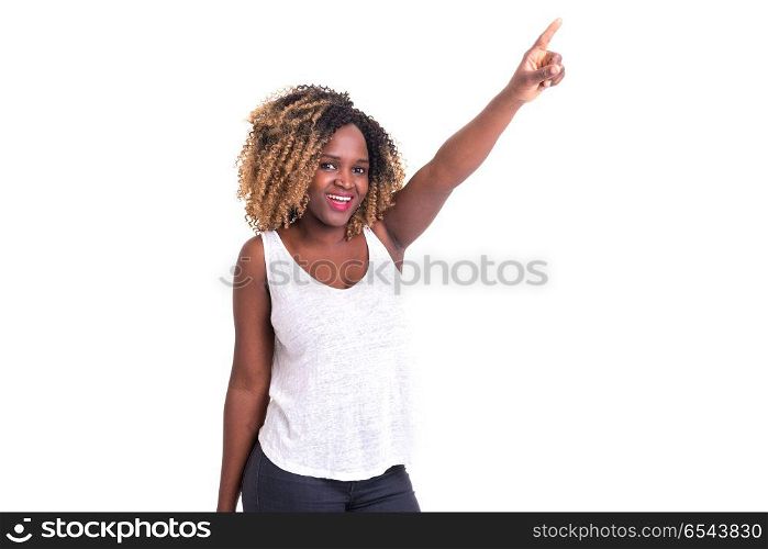 Hey look at that!. A beautiful woman pointing to something, isolated over a white background