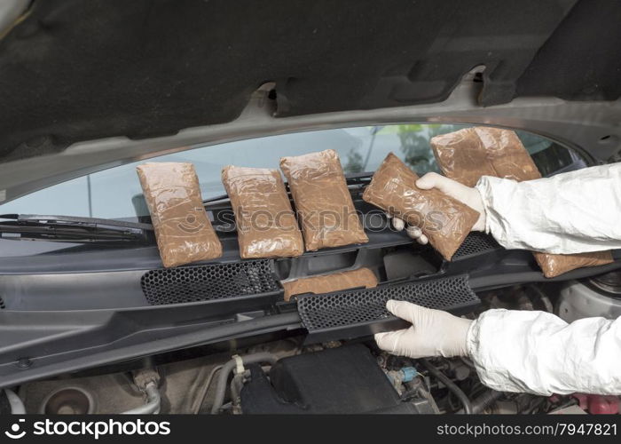 Hidden drugs in a vehicle compartment