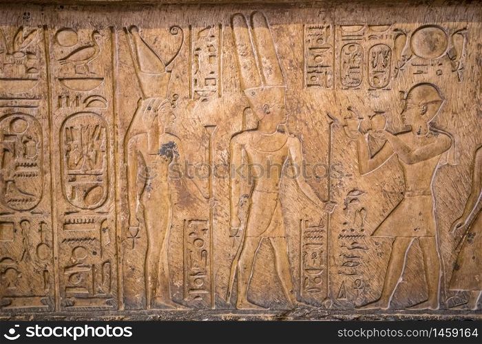 Hieroglyphic drawings and paintings on the walls of the ancient Egyptian temple