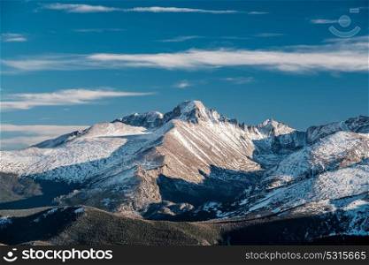 High alpine tundra landscape with rocks and mountains at autumn. Rocky Mountain National Park in Colorado, USA.