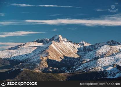 High alpine tundra landscape with rocks and mountains at autumn. Rocky Mountain National Park in Colorado, USA. 