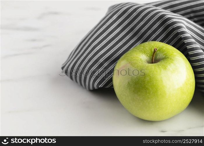 high angle apple table with cloth