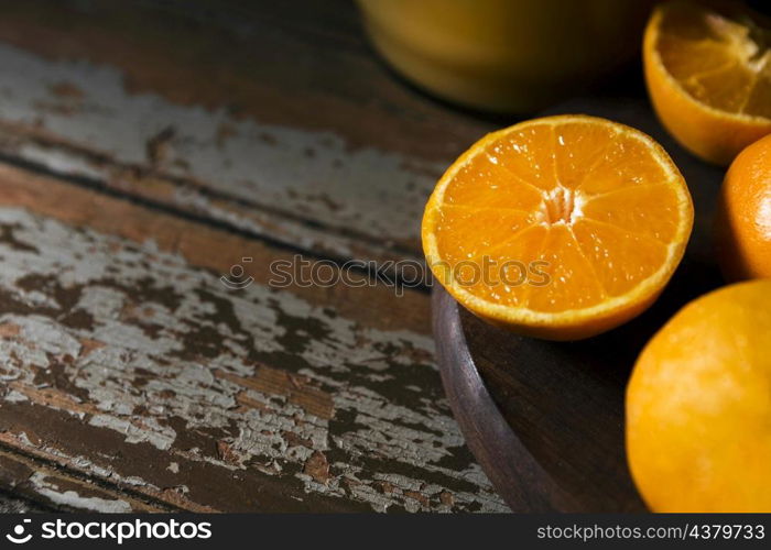 high angle autumn orange halves plate with copy space