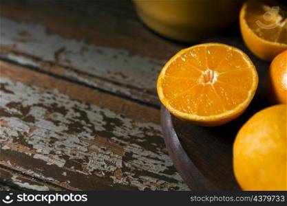 high angle autumn orange halves plate with copy space