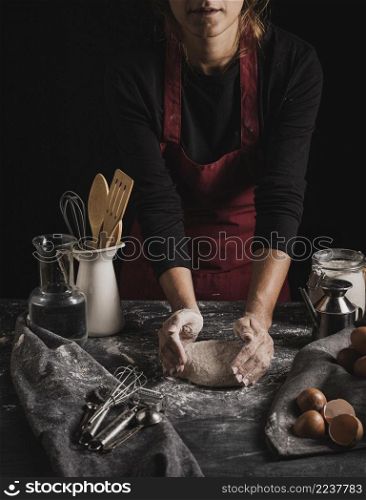 high angle baker kneading dough