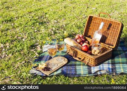 high angle basket full goodies picnic day. Resolution and high quality beautiful photo. high angle basket full goodies picnic day. High quality beautiful photo concept