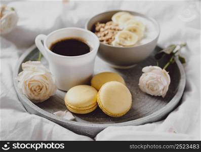 high angle breakfast bowl with coffee macarons