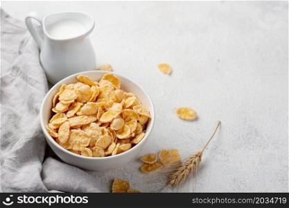 high angle breakfast corn flakes with milk copy space