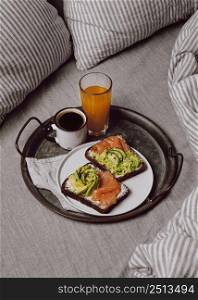 high angle breakfast sandwiches with salmon avocado