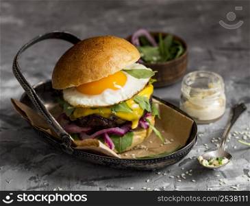 high angle burger with fried egg