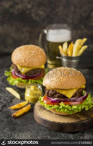 high angle burgers with fries sauce beer