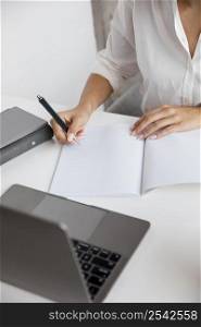 high angle businesswoman working with notebook laptop