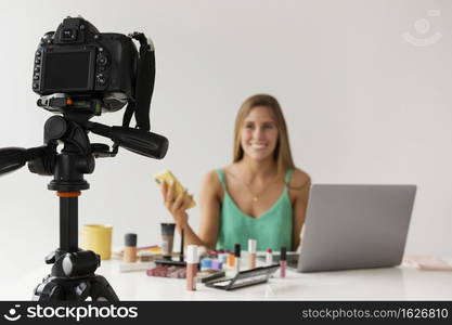 high angle camera filming woman