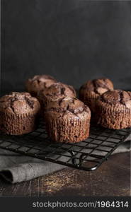 high angle chocolate muffins cooling rack with copy space. High resolution photo. high angle chocolate muffins cooling rack with copy space. High quality photo