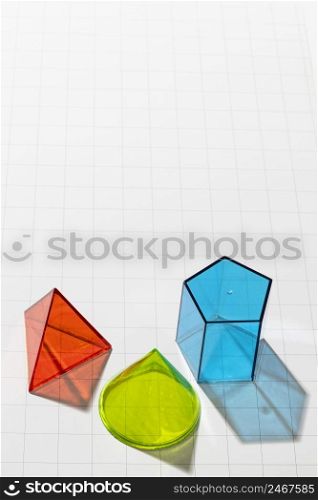 high angle colorful geometric forms with copy space