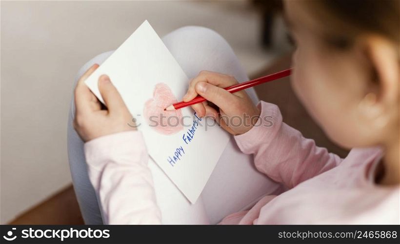 high angle daughter drawing card father s day