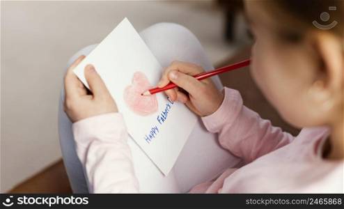high angle daughter drawing card father s day