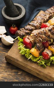 high angle delicious kebab with meat vegetables