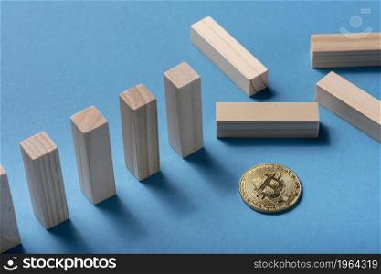 high angle domino pieces with bitcoin. High resolution photo. high angle domino pieces with bitcoin. High quality photo