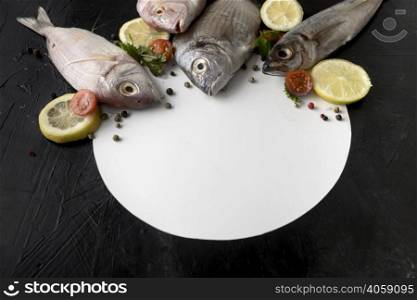 high angle fish with plate lemon