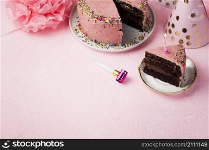 high angle frame with decorations pink cake