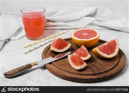 high angle grapefruit slices with juice. High resolution photo. high angle grapefruit slices with juice. High quality photo
