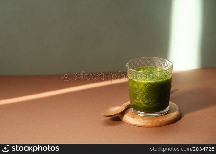 high angle green smoothie glass