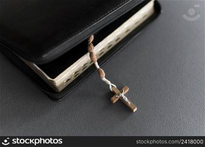 high angle holy book with cross