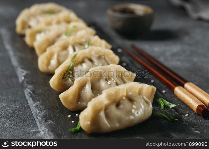 high angle japanese dumplings composition. Resolution and high quality beautiful photo. high angle japanese dumplings composition. High quality beautiful photo concept