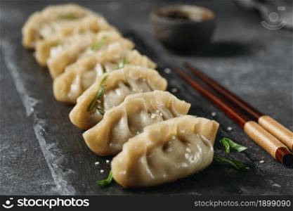 high angle japanese dumplings composition. Resolution and high quality beautiful photo. high angle japanese dumplings composition. High quality beautiful photo concept