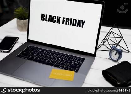 high angle laptop with black friday desktop