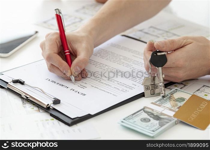 high angle man signing contract new home. Resolution and high quality beautiful photo. high angle man signing contract new home. High quality beautiful photo concept