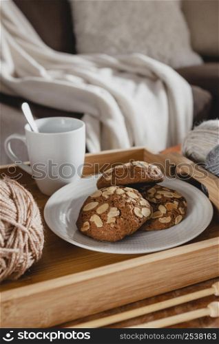 high angle mug cookies tray