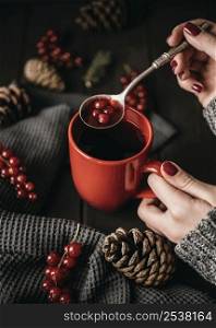 high angle mug with hot drink cranberries
