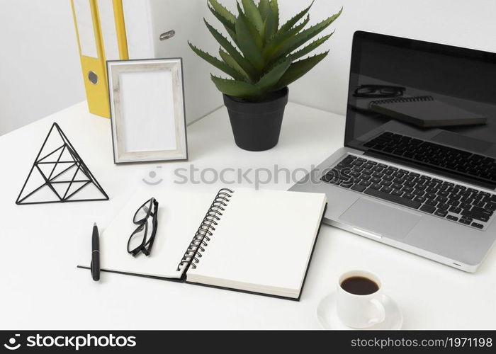 high angle office desk arrangement. High resolution photo. high angle office desk arrangement. High quality photo