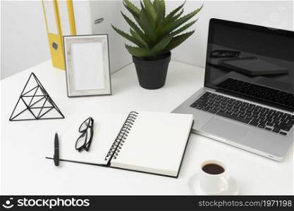 high angle office desk arrangement. High resolution photo. high angle office desk arrangement. High quality photo