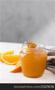 high angle orange jam glass jar