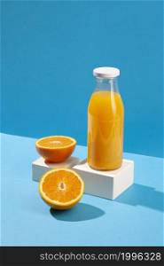 high angle orange juice bottle