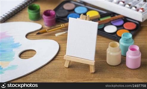 high angle painting essentials with easel palette