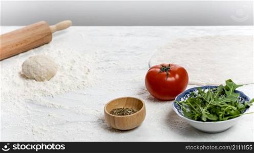 high angle pizza dough ingredients