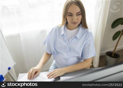 high angle pregnant businesswoman her desk with computer