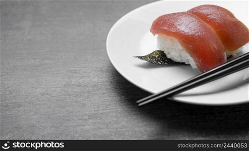 high angle raw fish plate with sticks