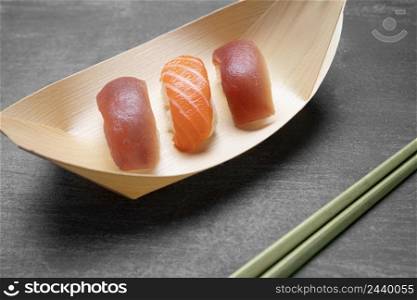 high angle raw fish with rice plate