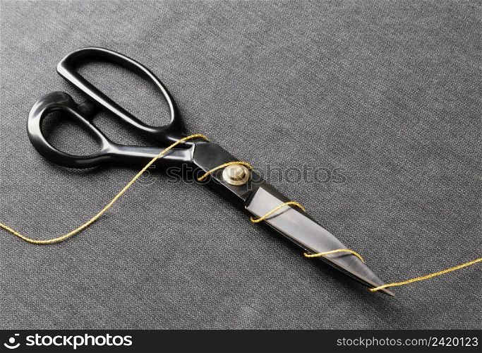 high angle scissors with thread