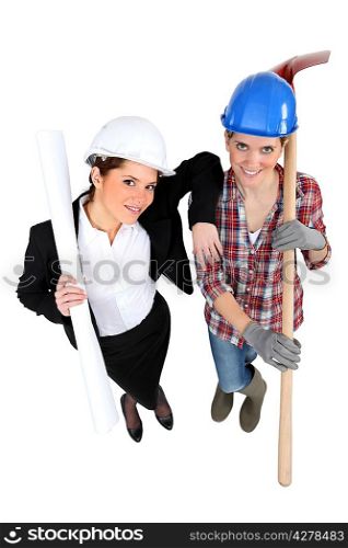 High-angle shot of a tradeswoman standing next to an engineer