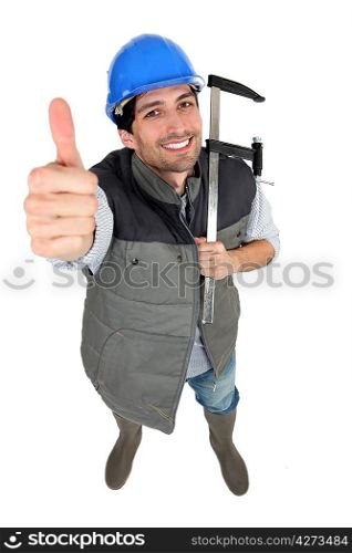 high angle shot of builder with thumb up