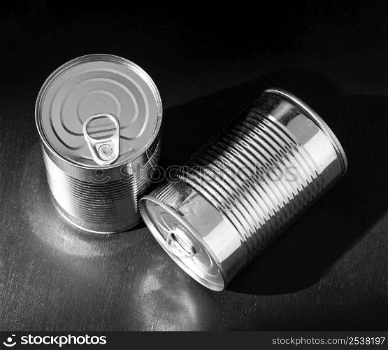 high angle silver tall round tin cans