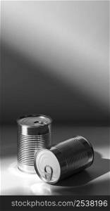 high angle silver tall round tin cans with copy space